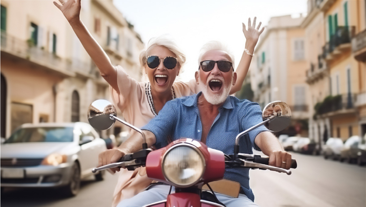 A retired couple riding a motorcycle while on vacation in a foreign country.