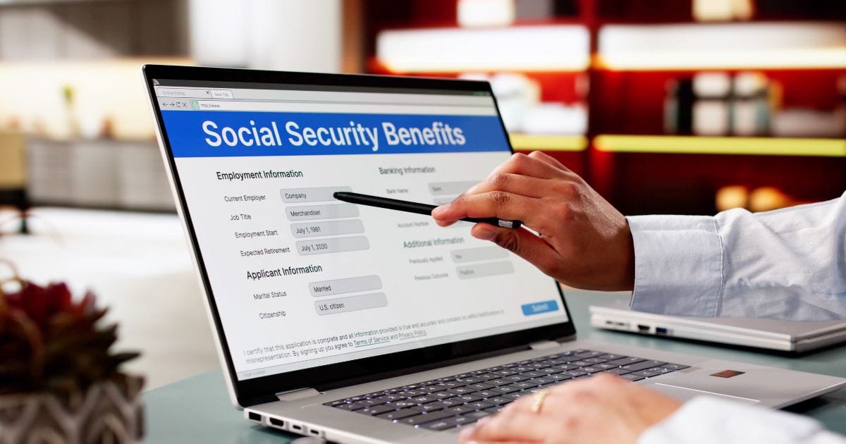 A retiree completing an application for Social Security benefits.