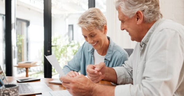 A retired couple planning RMDs from their retirement accounts