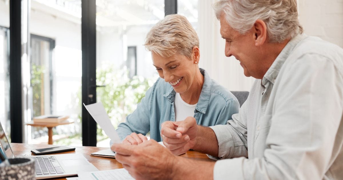 A retired couple planning RMDs from their retirement accounts