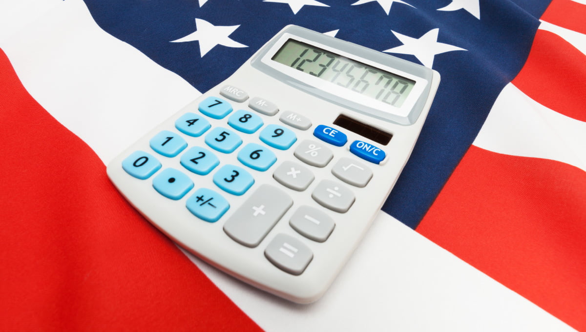 A calculator sitting on an American flag.